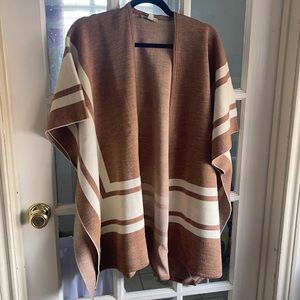 Brown and white poncho sweater